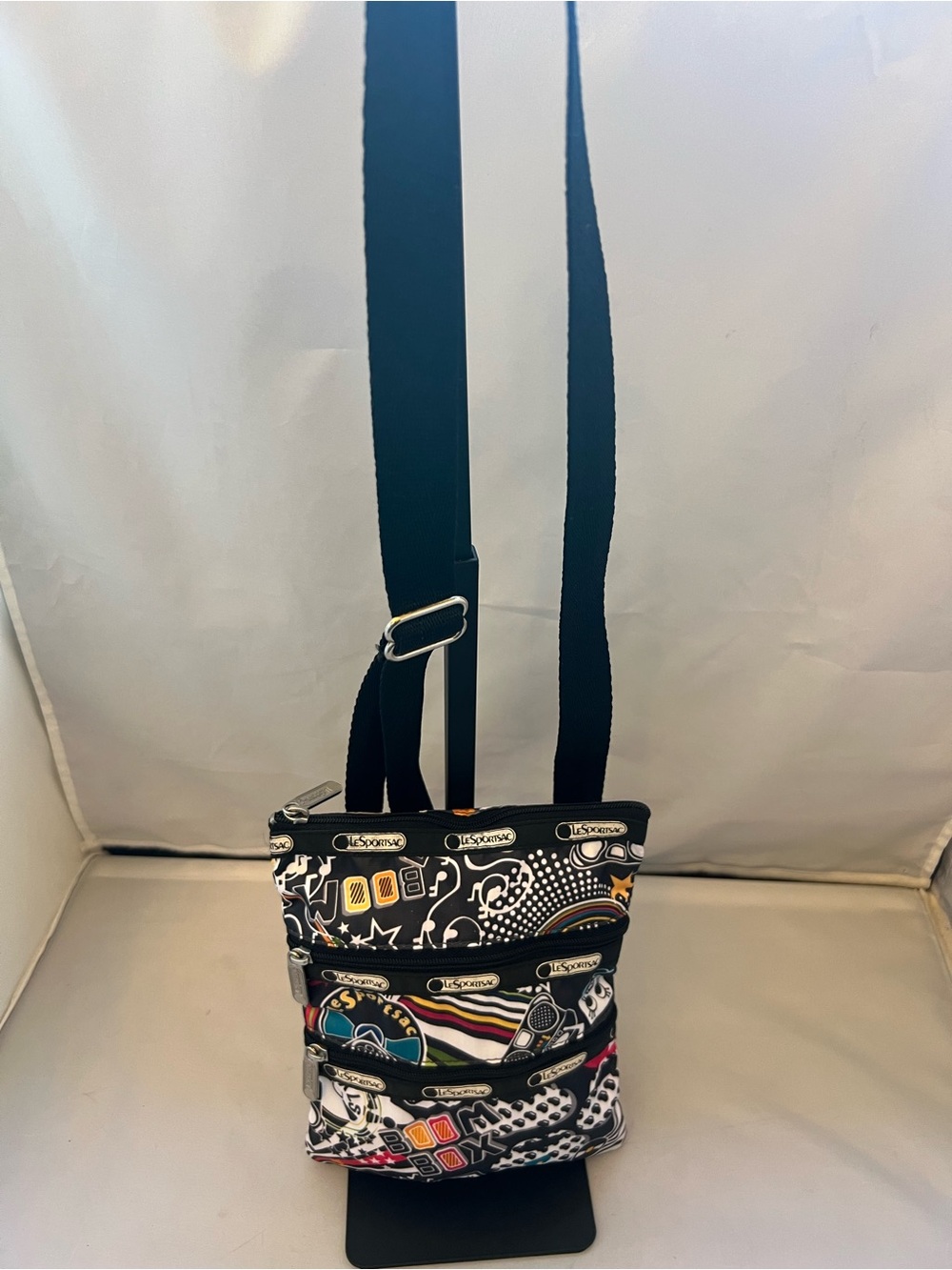 Lesportsac Black Pouch with Colorful Graphic Accents and Silver Zip Pull
